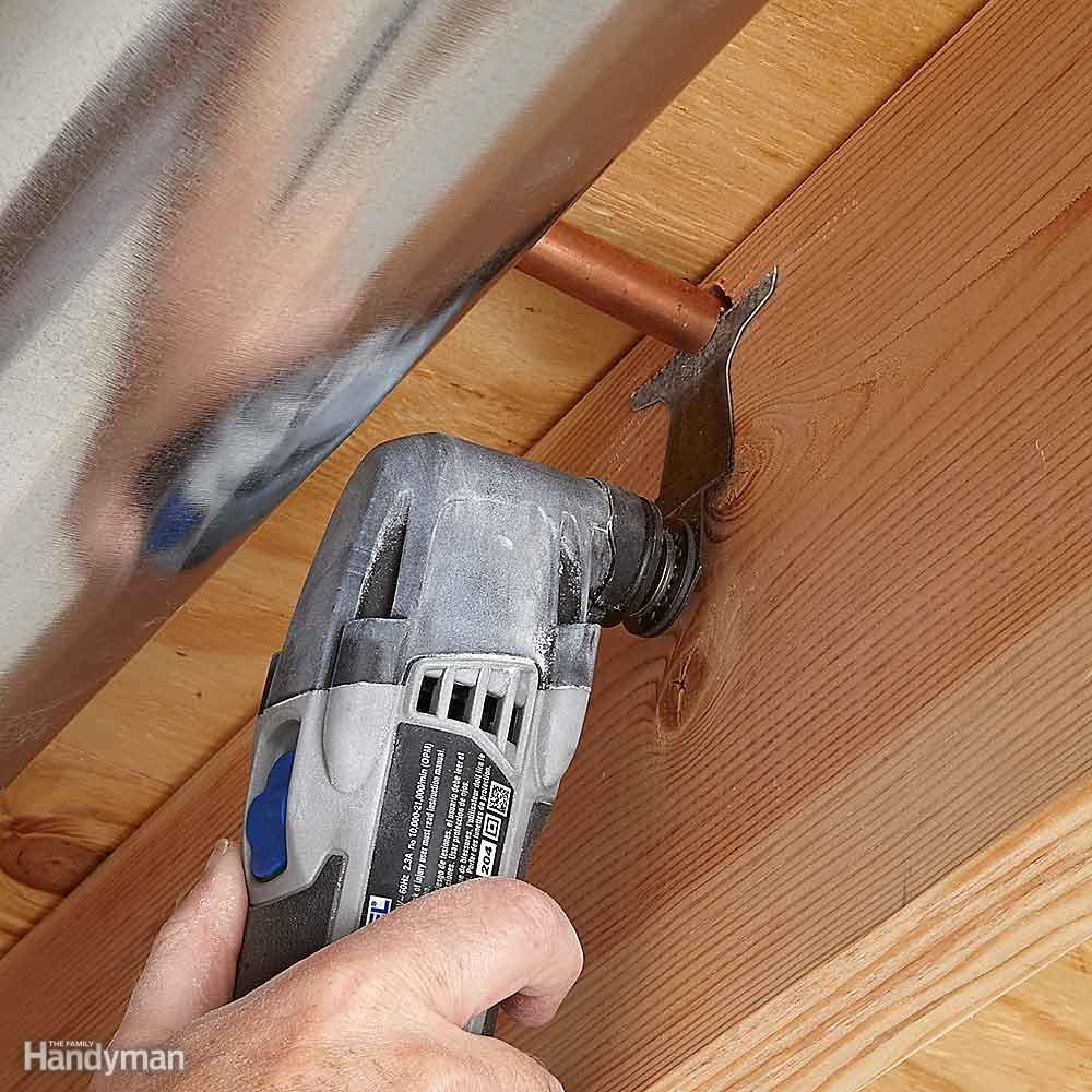 Use an oscillating tool to make cuts in hard-to-reach spaces