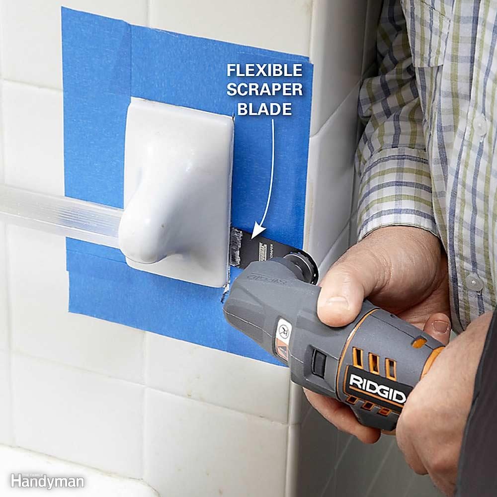 Remove towel bars with an oscillating tool. 