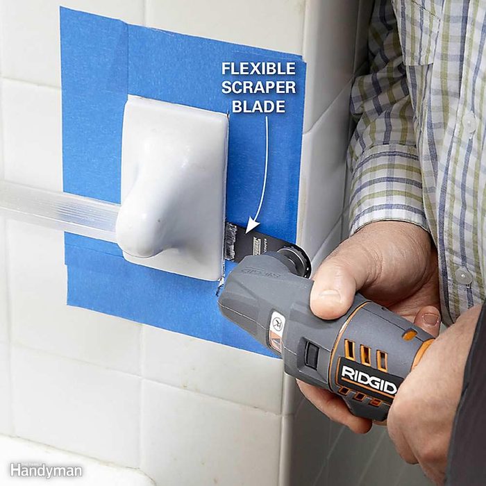 Remove towel bars with an oscillating tool.