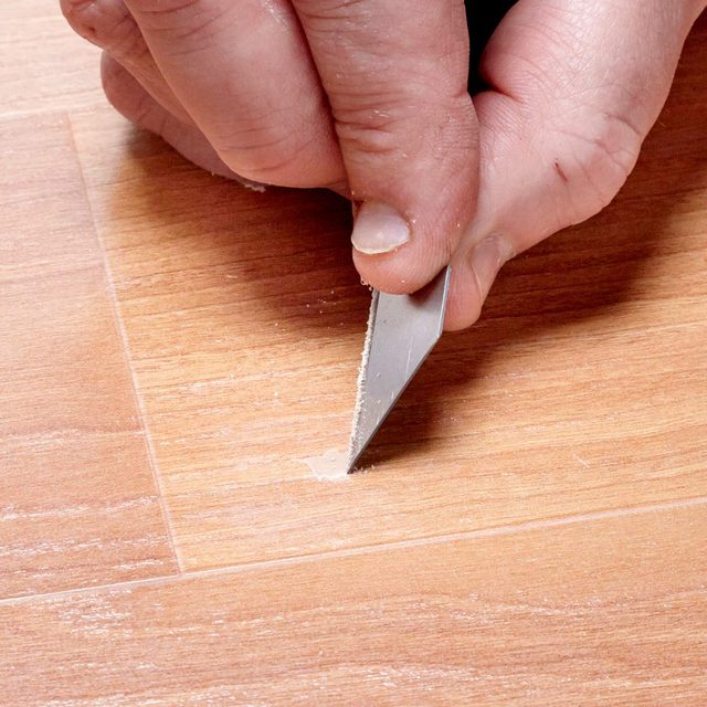 chipped laminate flooring