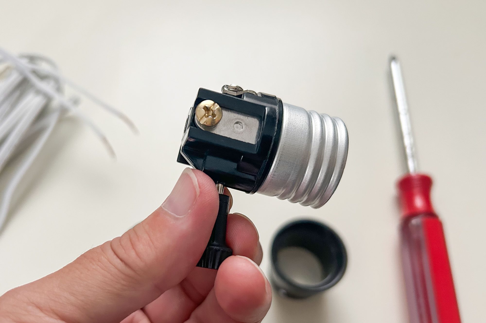 Lamp socket in hand, How To Wire A Light Socket In A Lamp Ally Childress For Family Handyman Lamp Socket Hot Brass Screw Ksedit