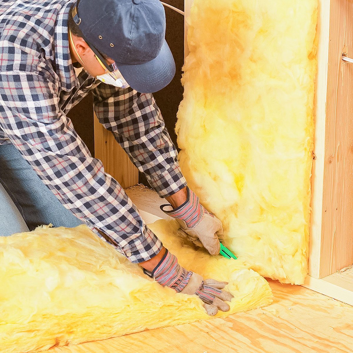 Cutting Fiberglass Batt Insulation with Utility Knife