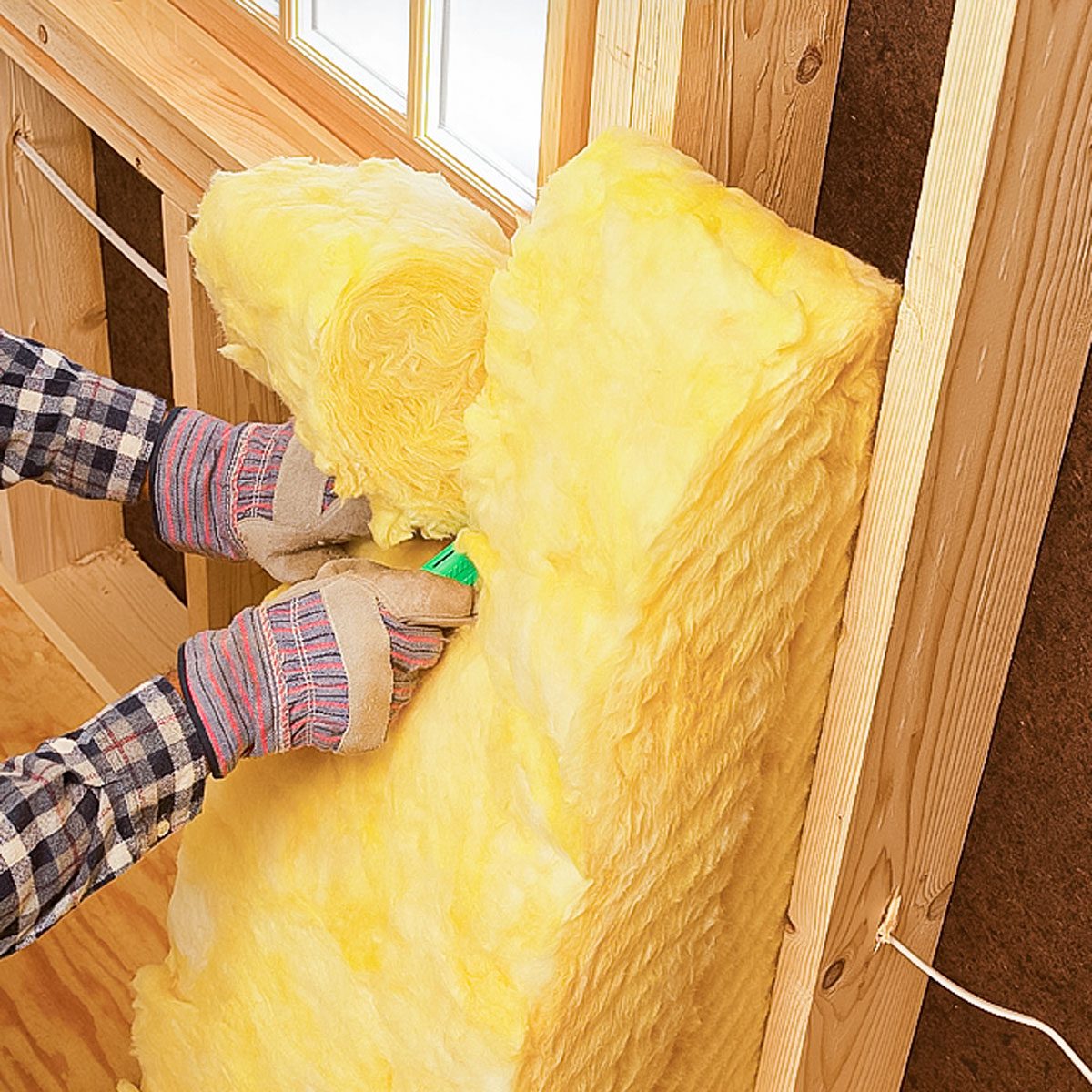 Cutting Fiberglass Batt Insulation with Utility Knife