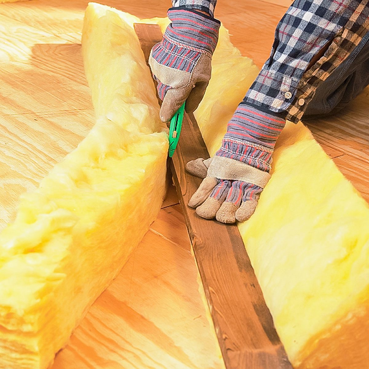 Cutting Fiberglass Batt Insulation with Utility Knife