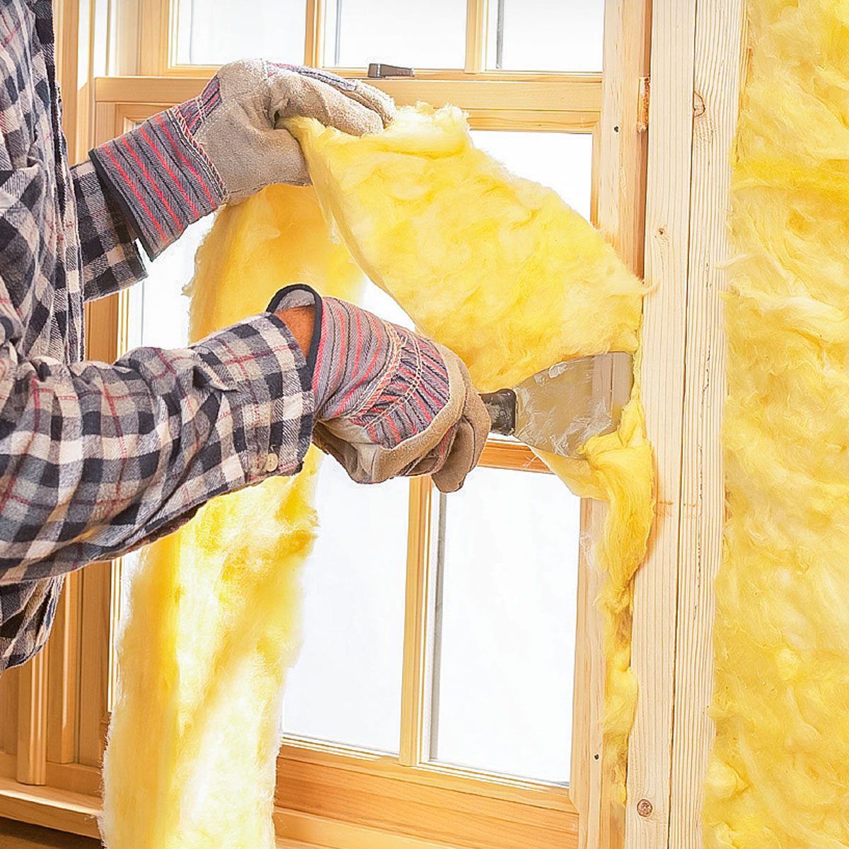 Filling Gaps with Fiberglass Batt Insulation around Windows