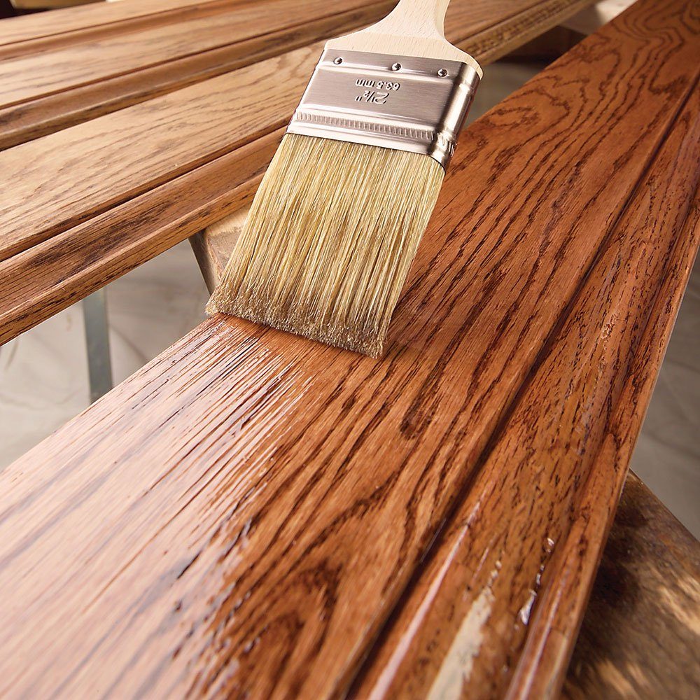 Applying long brush strokes on a length of trim | Construction Pro Tips