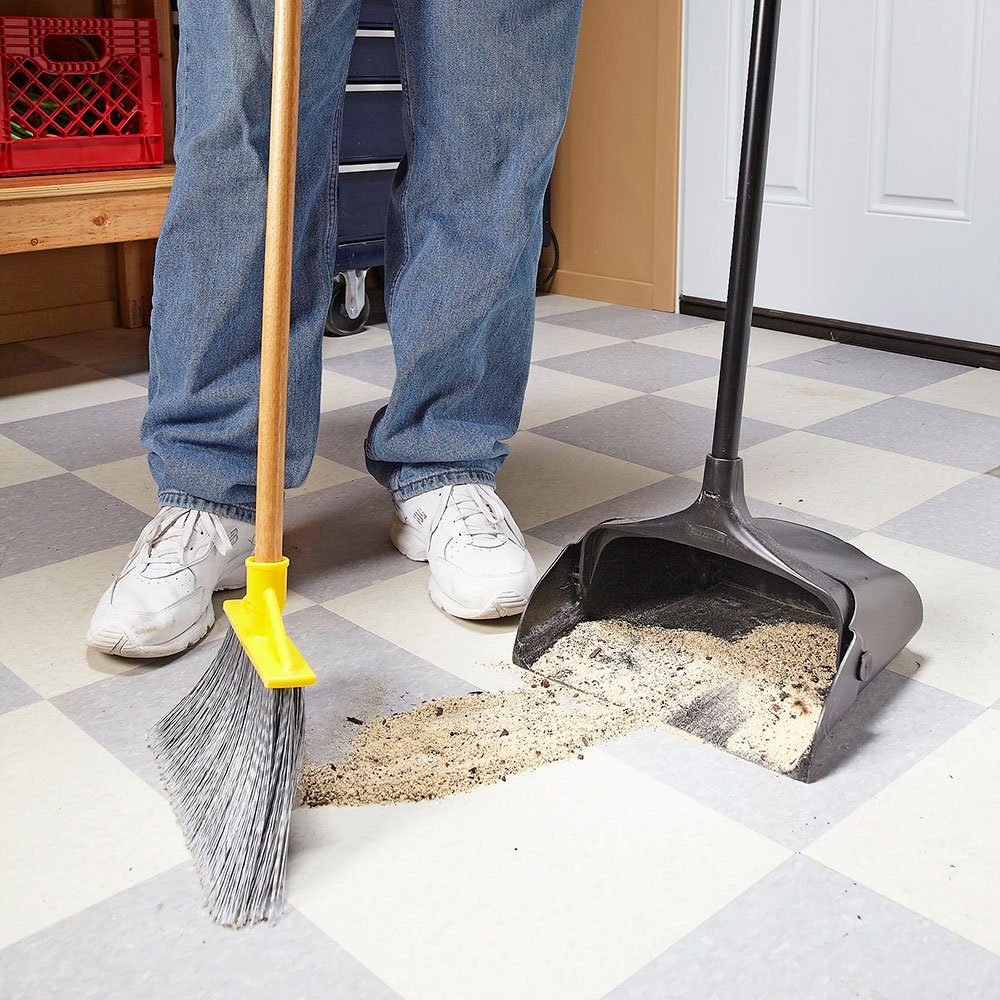 Sweeping up dust and sand into a dustbin | Construction Pro Tips