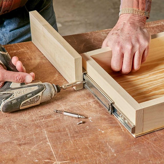 finish attaching under-cabinet drawer slides