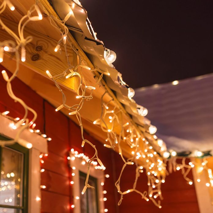 outdoor string lights on house around windows christmas lights