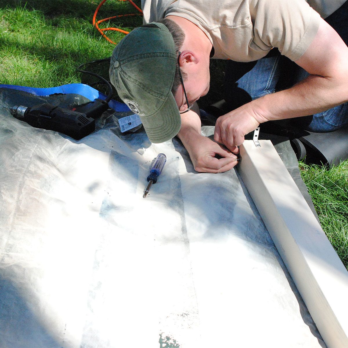 Attach brackets to post birdhouse pole