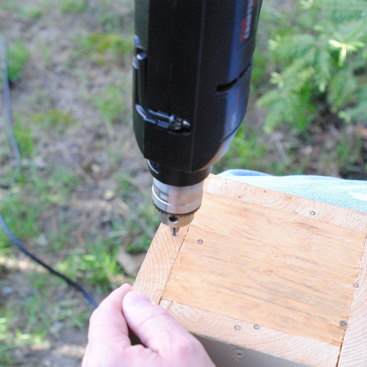 Drill holes into the birdhouse