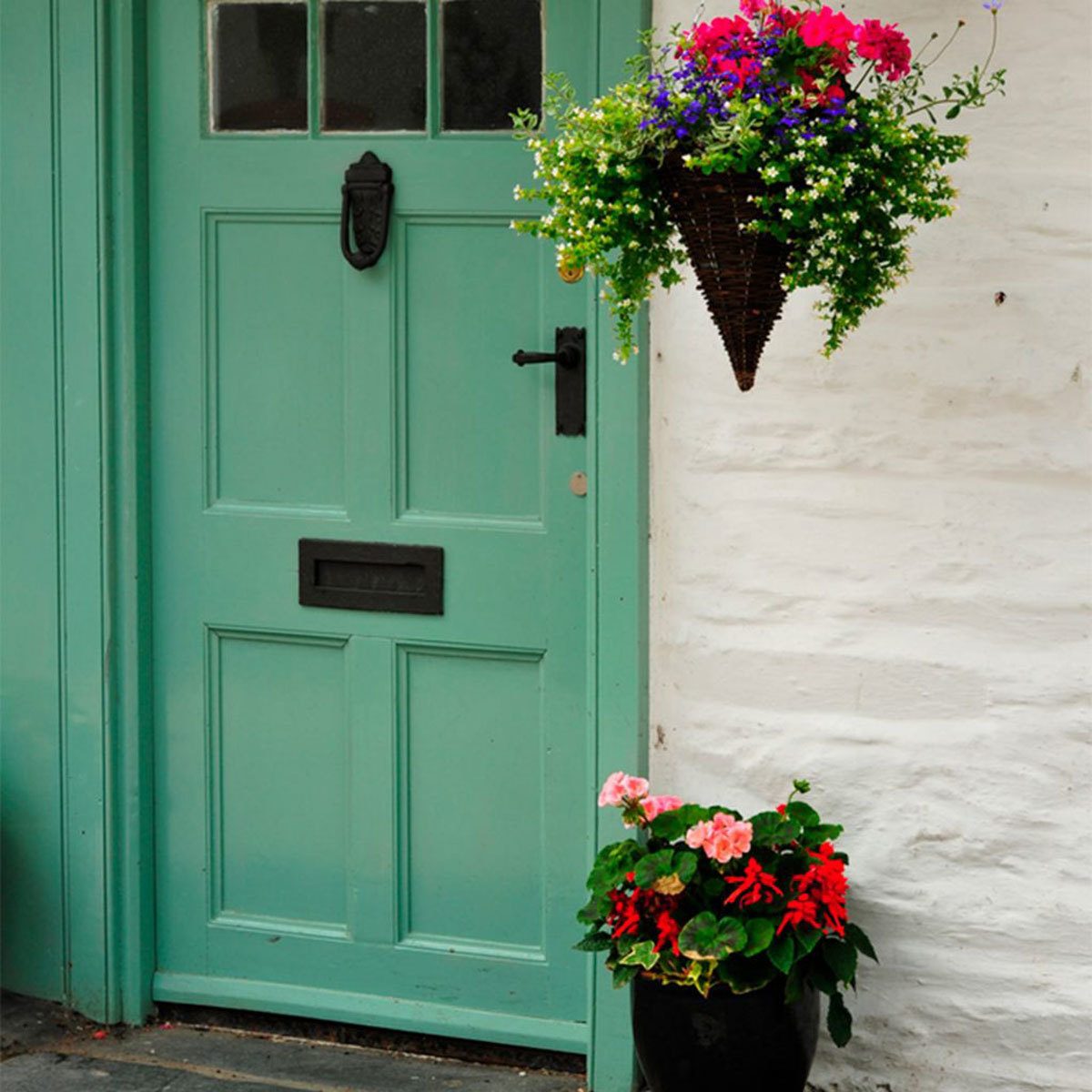 dfh17jul019-9-shutterstock_56486248-1200x1200 new front door curb appeal resale value hanging flowers