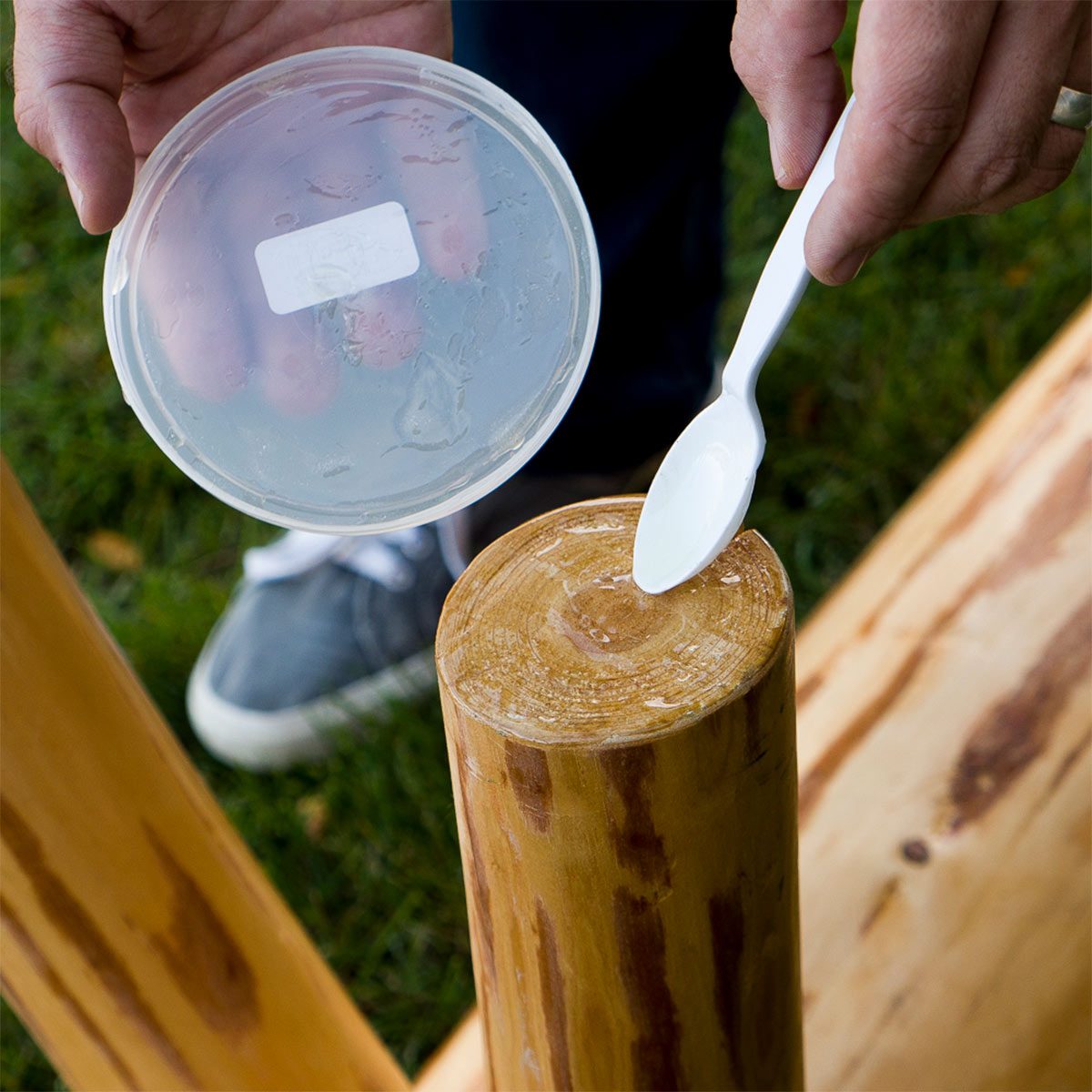 spread epoxy onto bench feet