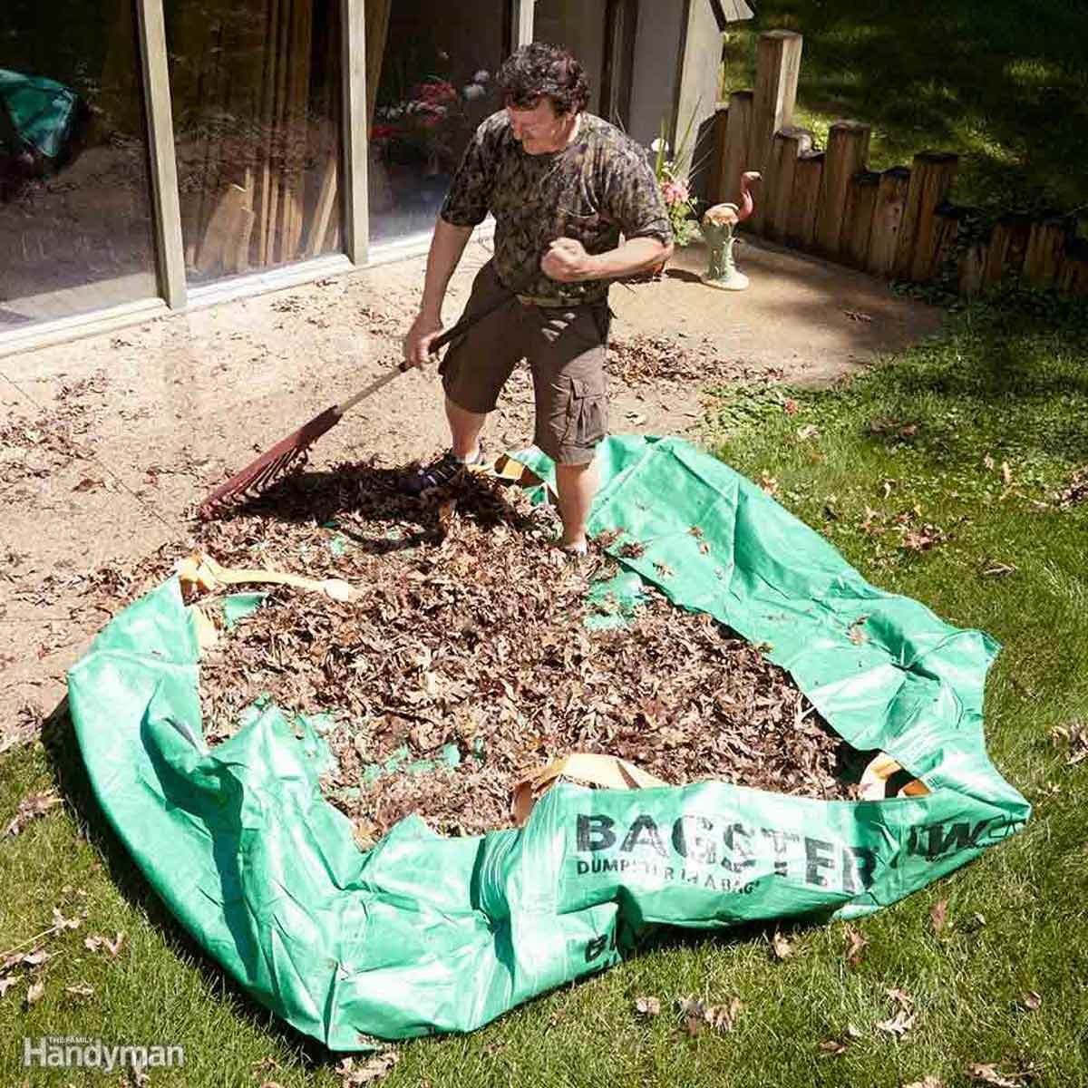 fh14may_548_08_018 rake leaves on a tarp