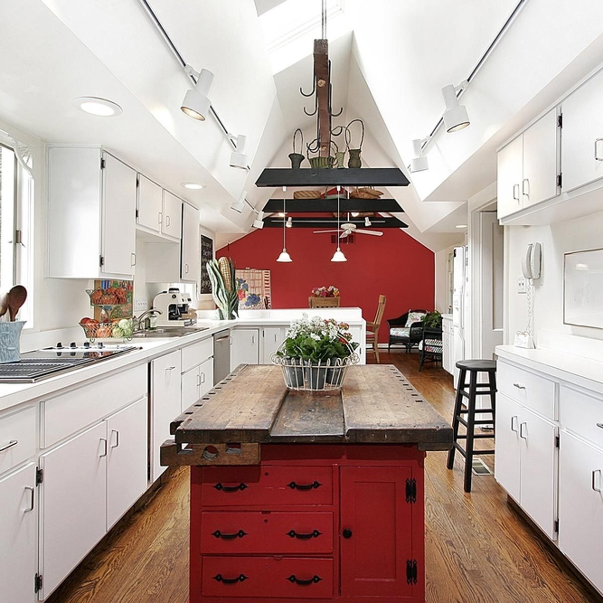 shutterstock_28075930 kitchen island with bold red color vaulted ceilings