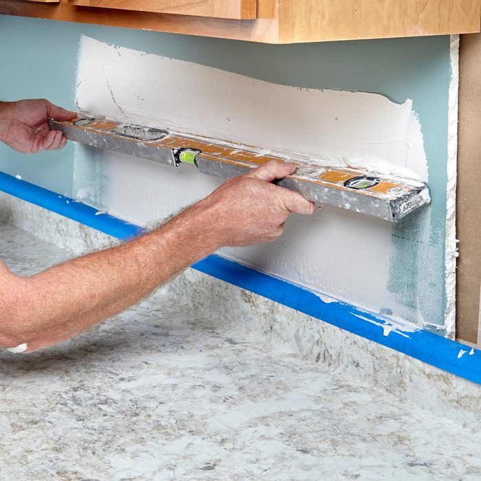 flatten walls and make sure they are level | Construction Pro Tip