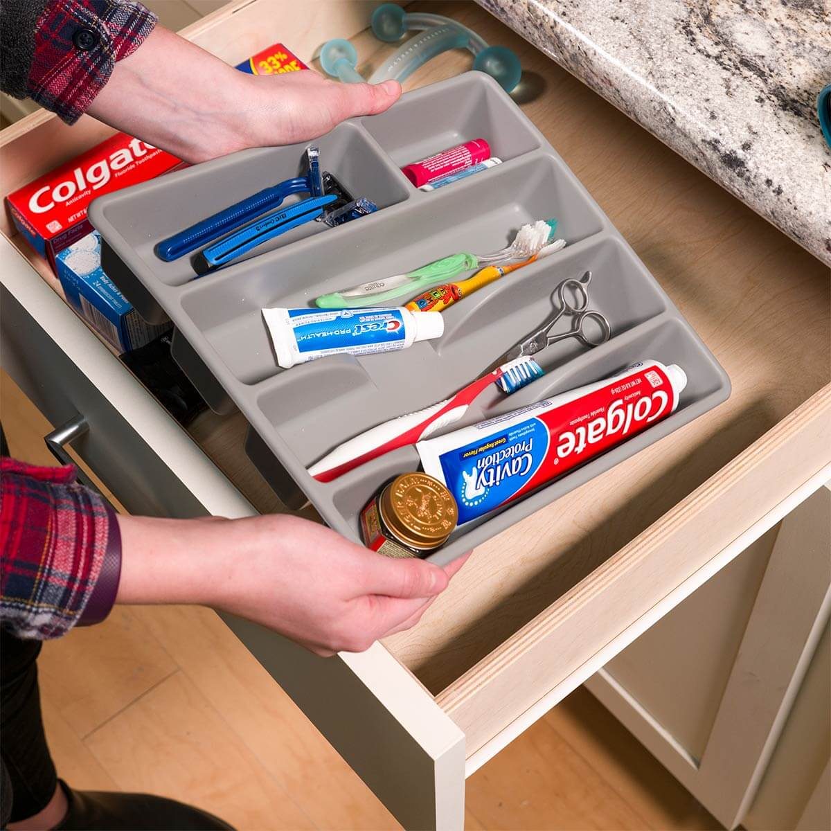 use a silverware organizer in the bathroom