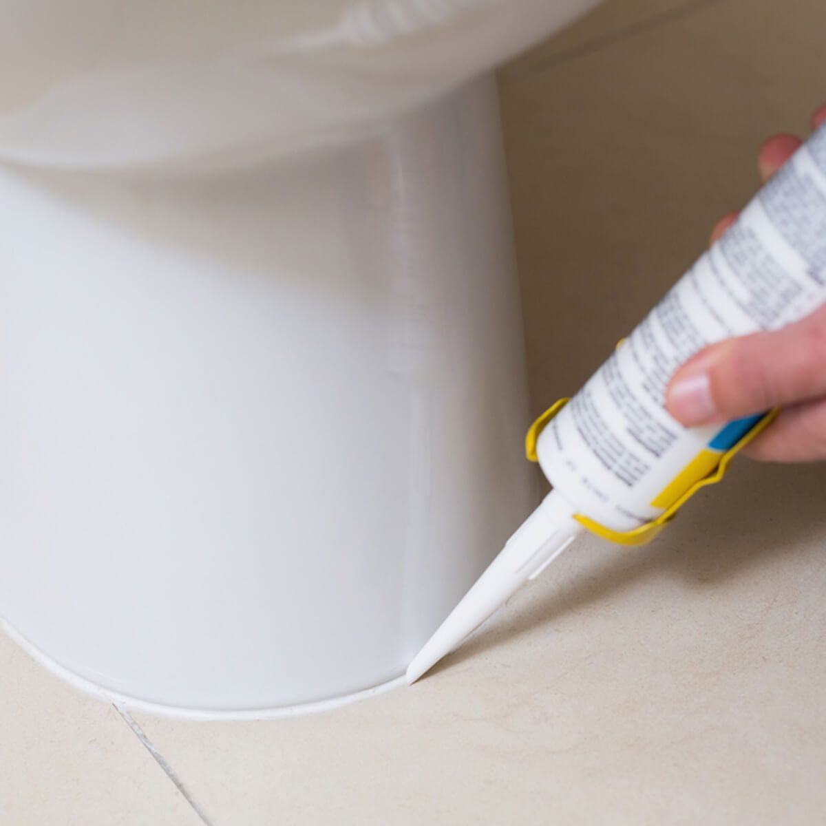 caulk around a toilet