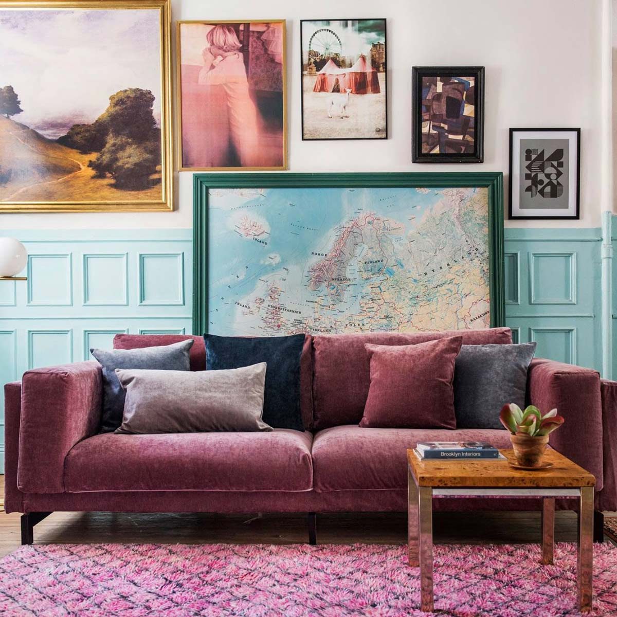 16602553_10154886655291827_7378471443532006336_o purple couch cover living room gallery wall