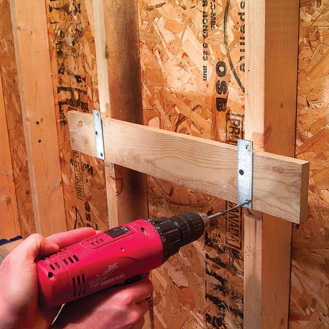 FH04MAR_03251_006 mending plates wheel barrow rack