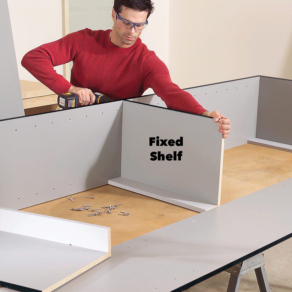 assembling shelves of a garage cabinet