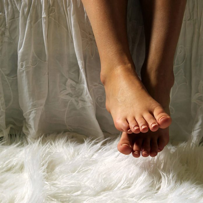 shutterstock_677400019 bed skirts fuzzy rug