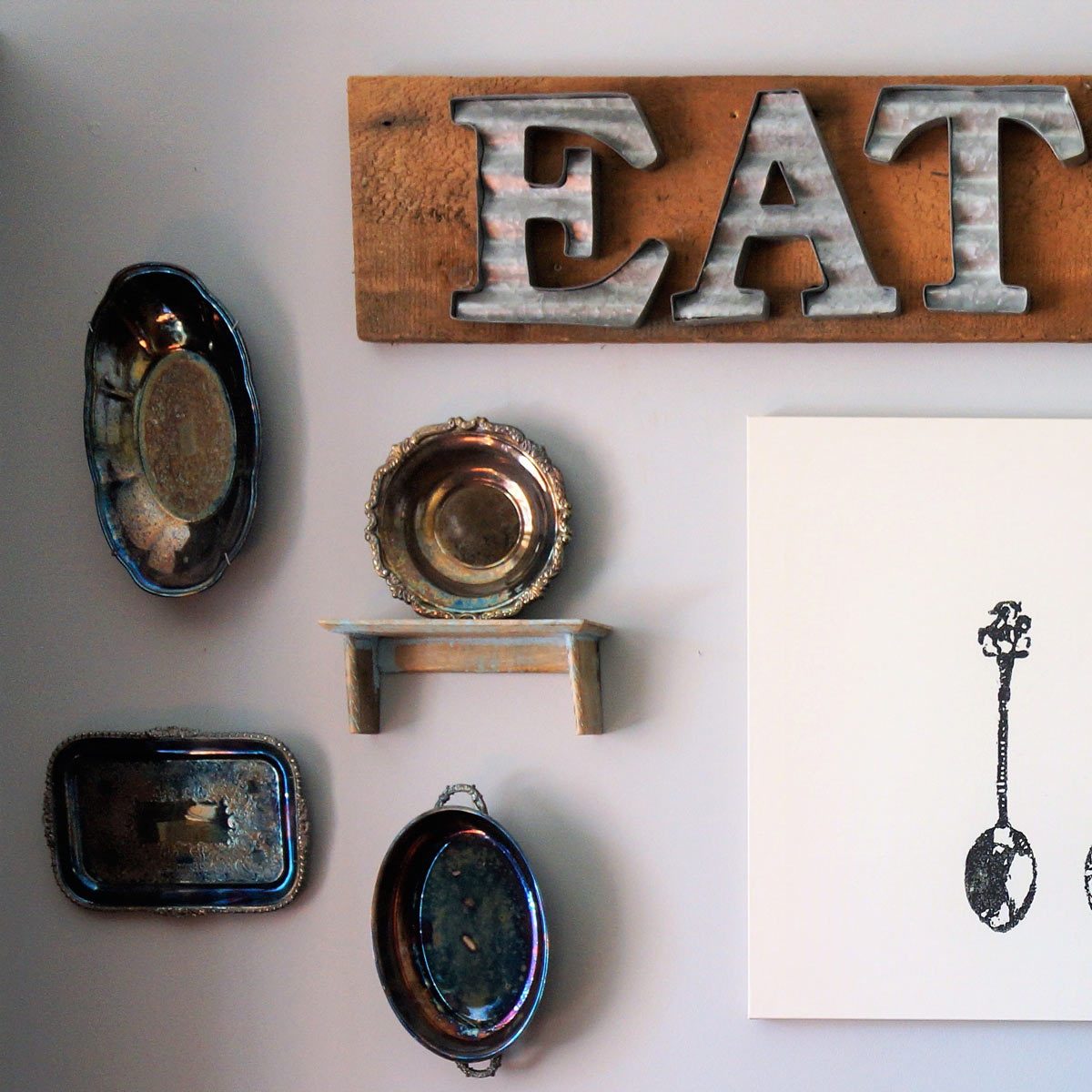 metal plates and platters eat sign