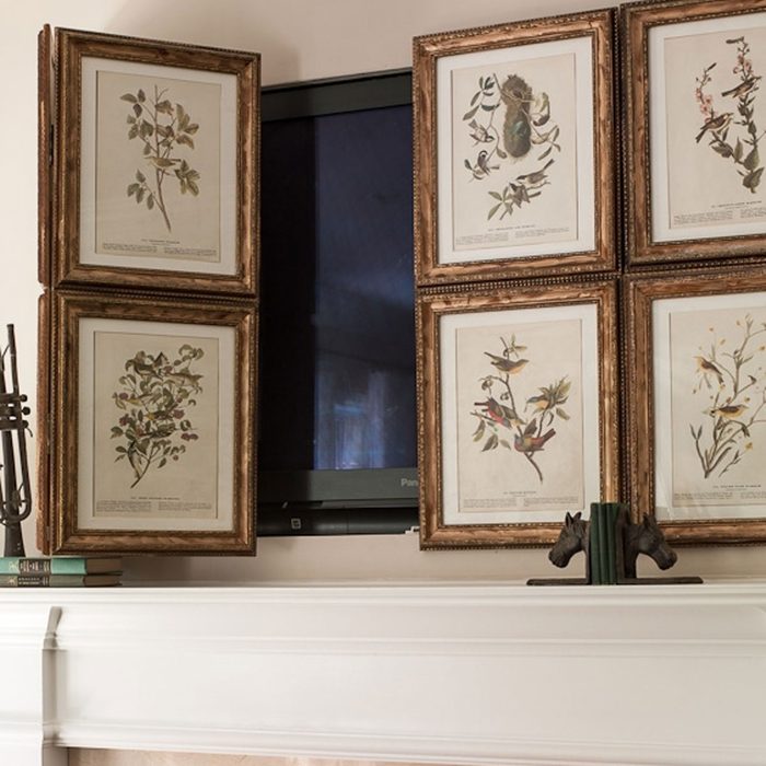 TV installation behind artwork