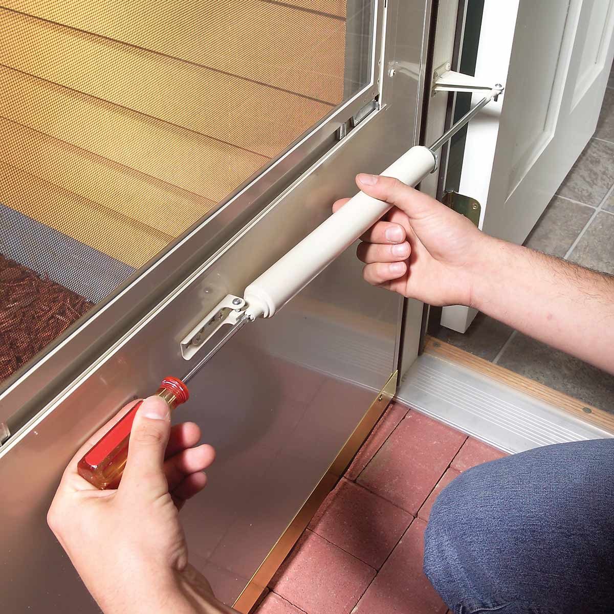 Adjust storm door