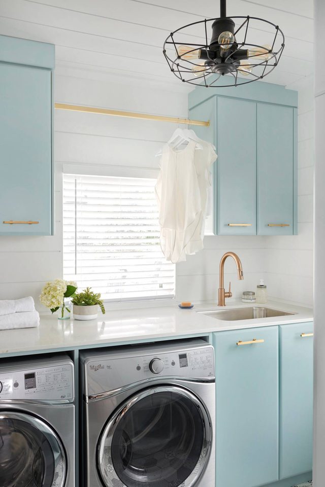 laundry room organization ideas blue cabinets