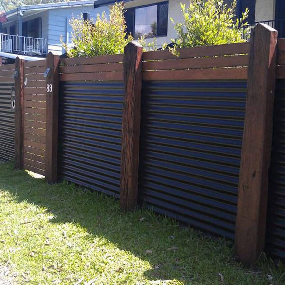 Wood and Corrugated Metal Fence