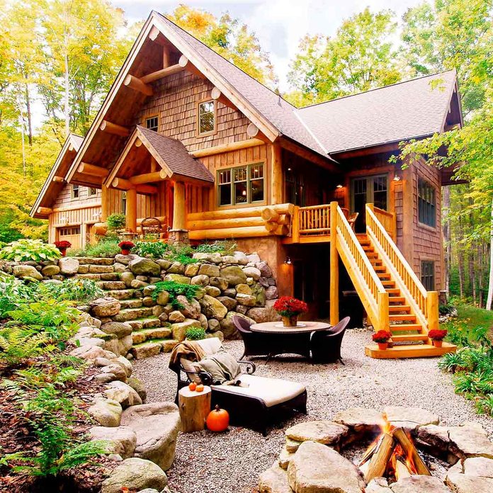 log cabin with landscaping
