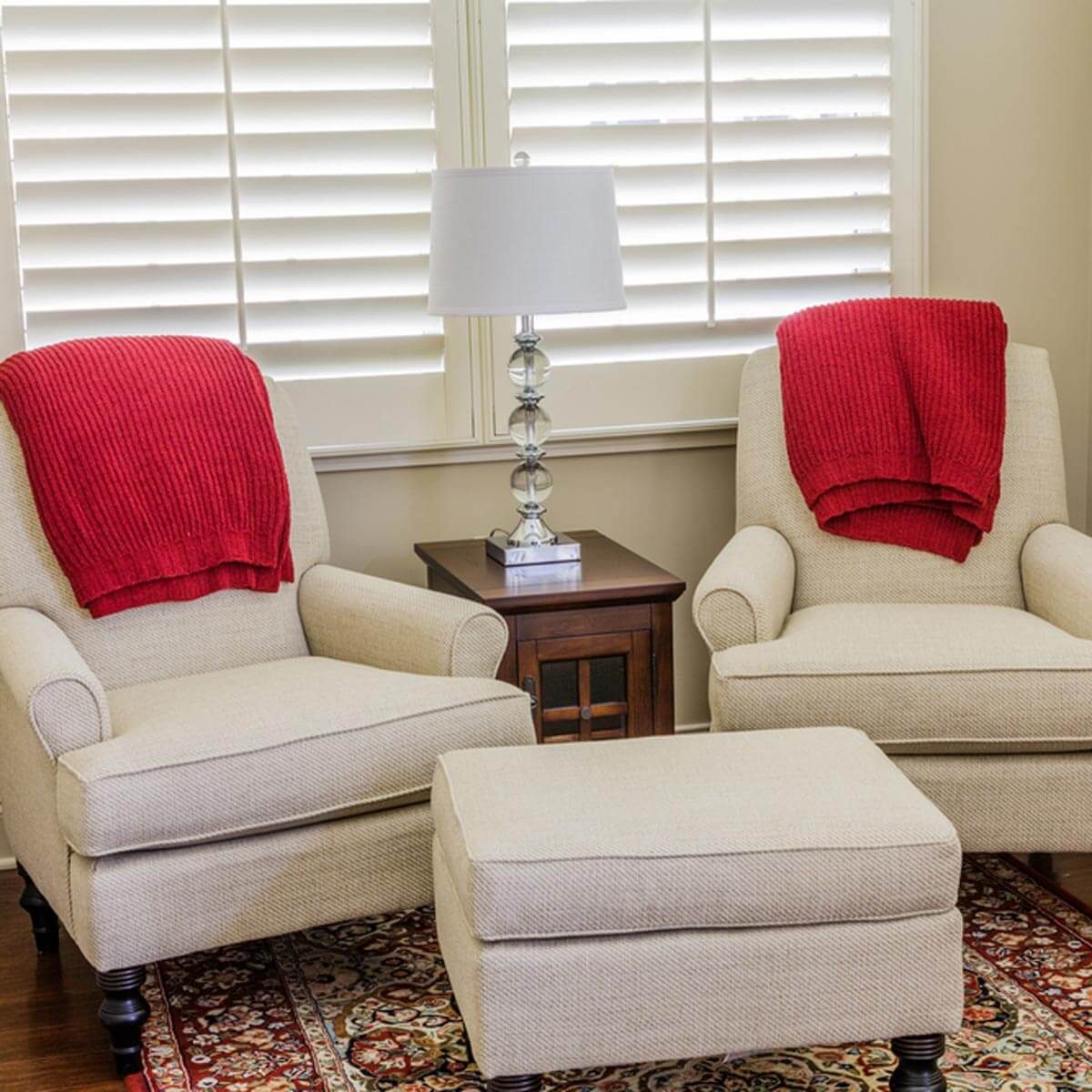 cream arm chairs traditional rug