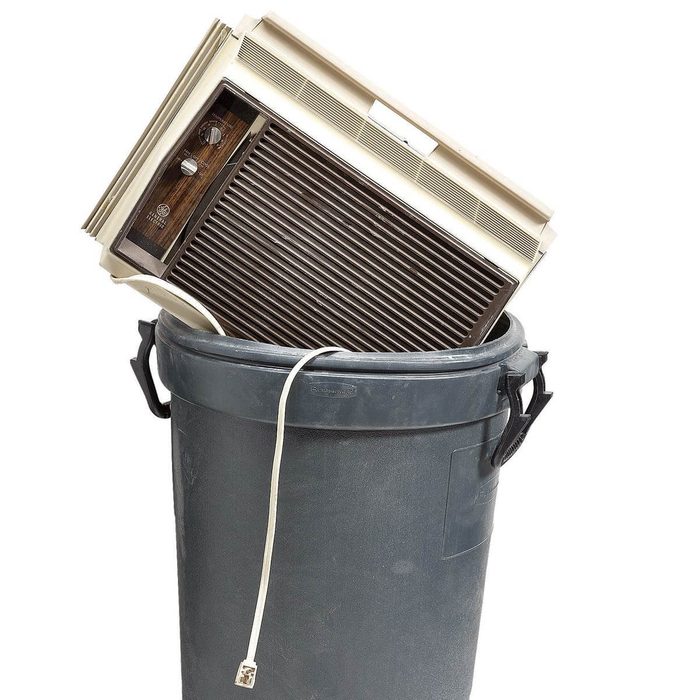 room air conditioner in trash can