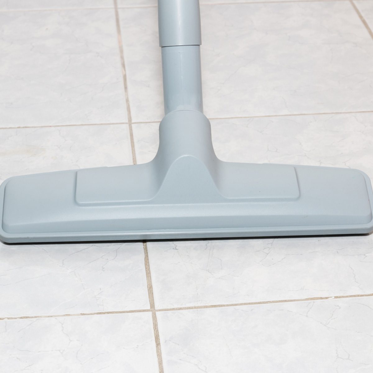 vacuum clean bathroom tile