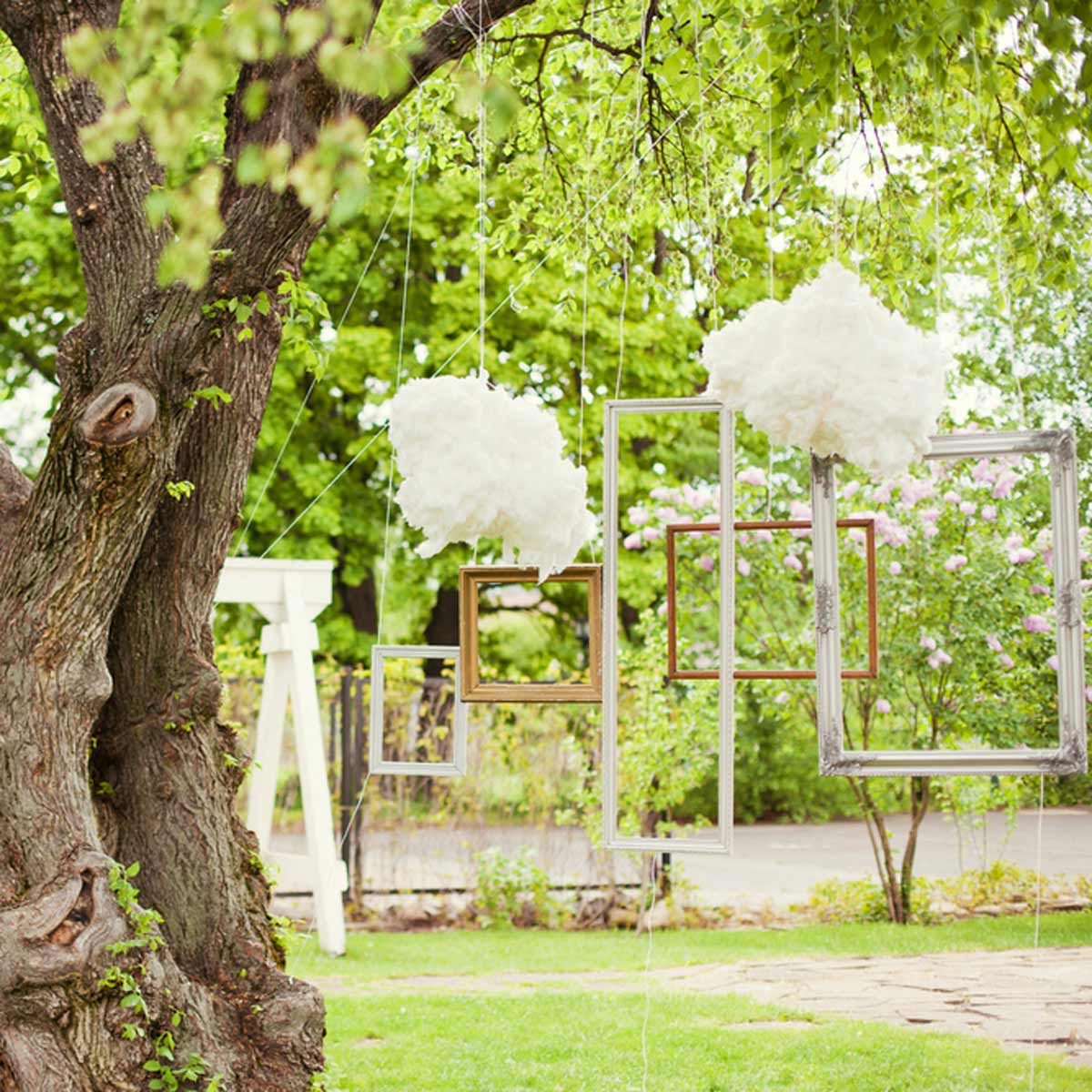 DIY wedding photo booth picture frames from trees simple outdoor wedding ideas