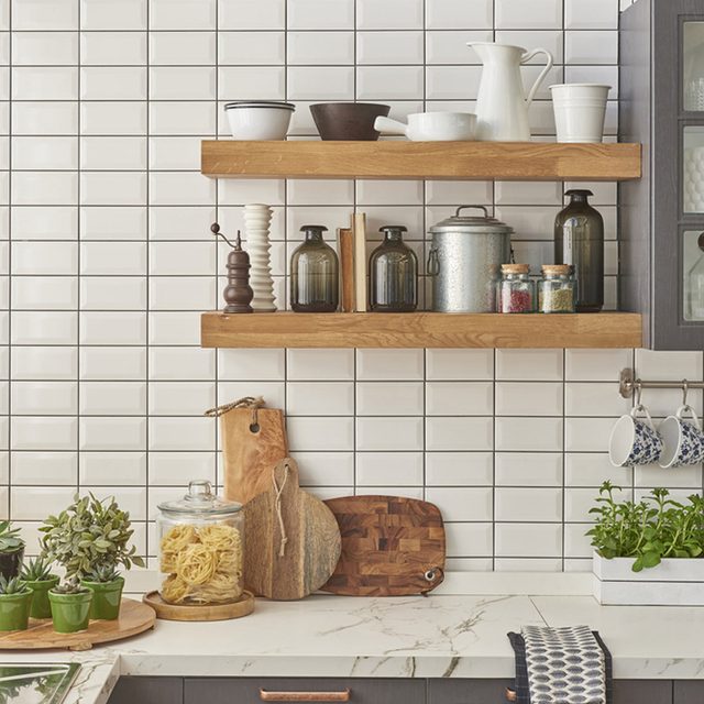 white subway tile in kitchen open shelves