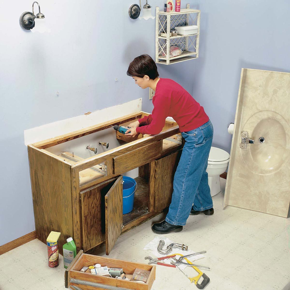 Before and after bathroom vanity upgrade demolition