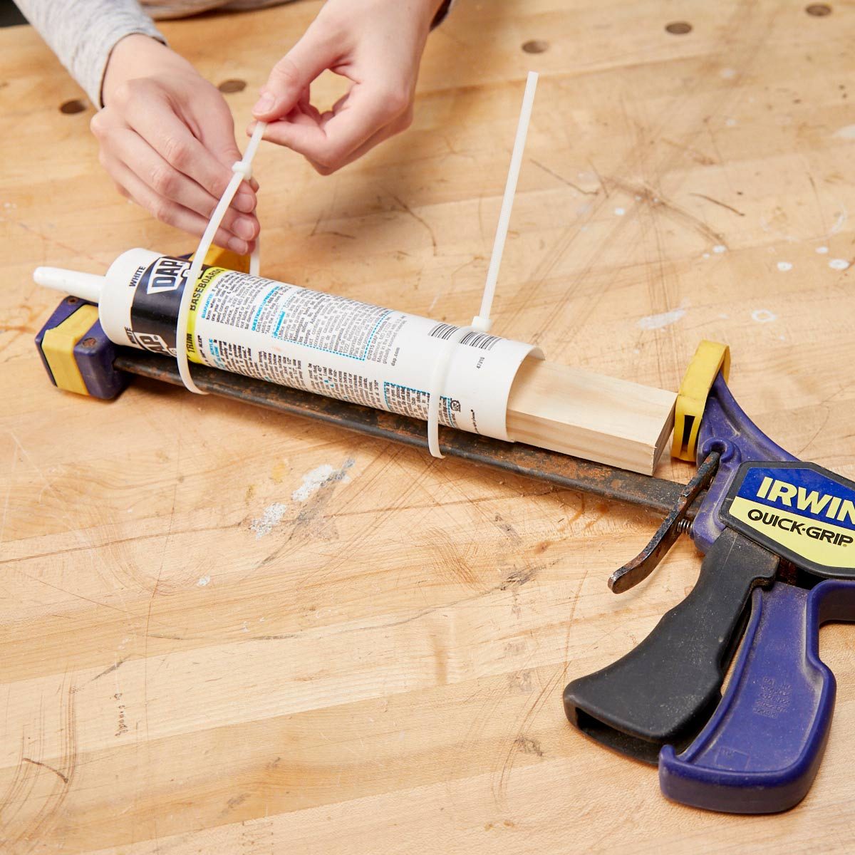 HH improvised caulk gun clamp zip-ties