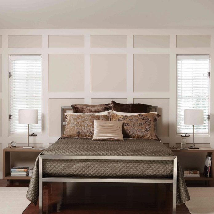 after bedroom makeover paneled wall