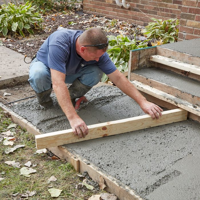 Screeding the sidewalk | Construction Pro Tips