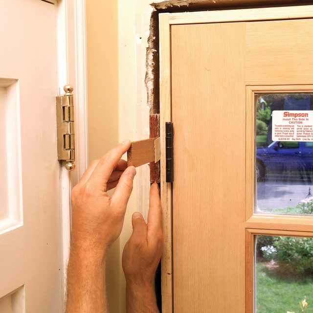 Shim the hinge-side jamb