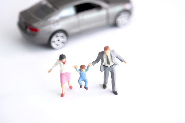 miniature figure of family  on white background