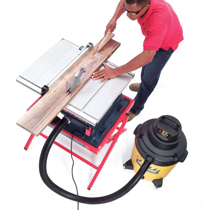 Cutting on a table saw with a vacuum attached | Construction Pro Tips