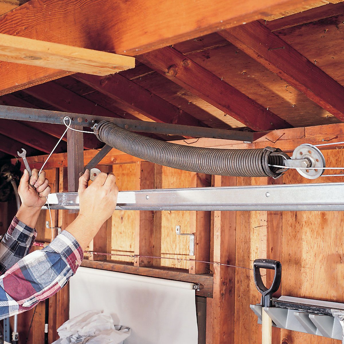 passing the cable through the spring