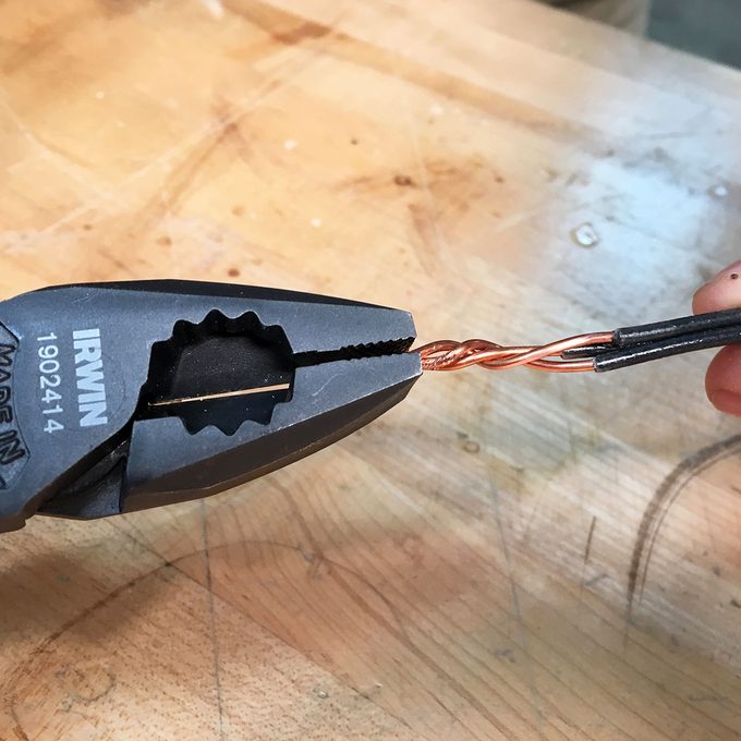 Twist the wires Twisting wires with a linesman's pliers | Construction Pro Tips