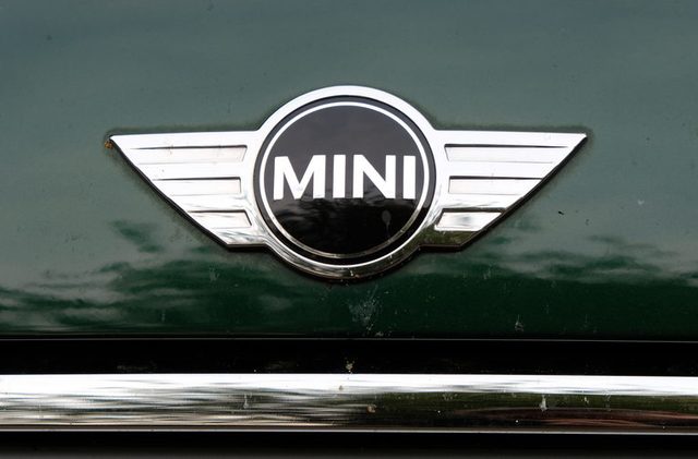 Berlin, Germany - June 22, 2017: Mini Cooper logo. Introduced in 1969, it is a British automotive marque owned by BMW which specialises in small cars