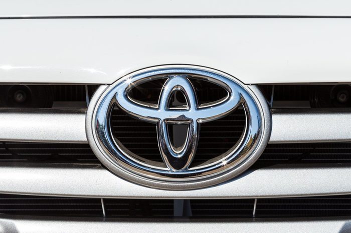 CHIANGRAI, THAILAND - DECEMBER 31, 2014 : Logo of Toyota car on display at Chiang Rai ASEAN flower festival 2014