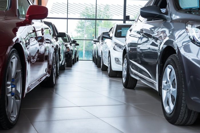 Modern beautiful showroom with cars being sold