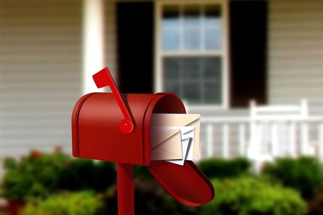 Mail Box In front of a House